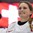 PLYMOUTH, MICHIGAN - MARCH 31: Switzerland's Livia Altmann #22 during the playing of Switzerland's national anthem following a 2-1 shootout win over Team Czech Republic during preliminary round action at the 2017 IIHF Ice Hockey Women's World Championship. (Photo by Minas Panagiotakis/HHOF-IIHF Images)